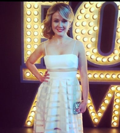 Picture of Arianwen Parkes-Lockwood posing for a photoshoot  wearing white color dress